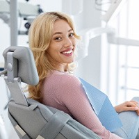 Woman smiling in dentist’s chair