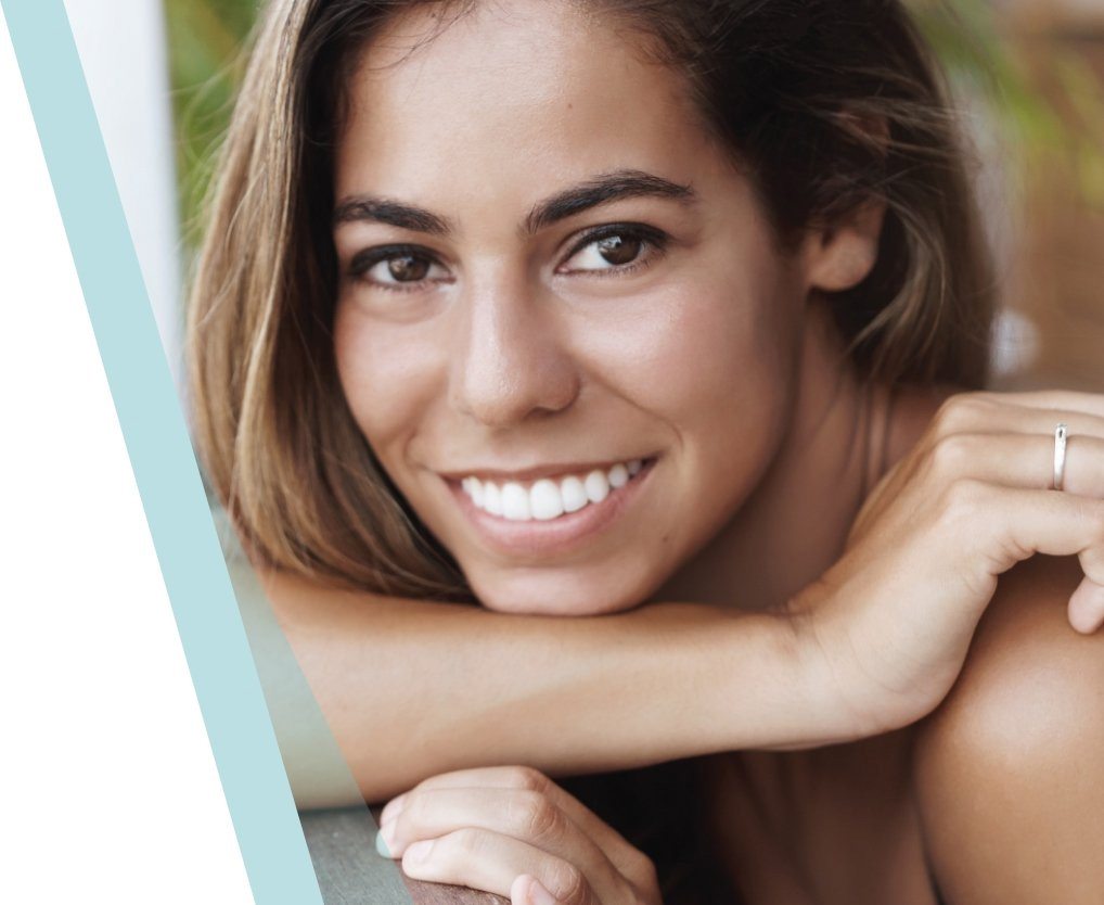 woman smiling after getting invisalign